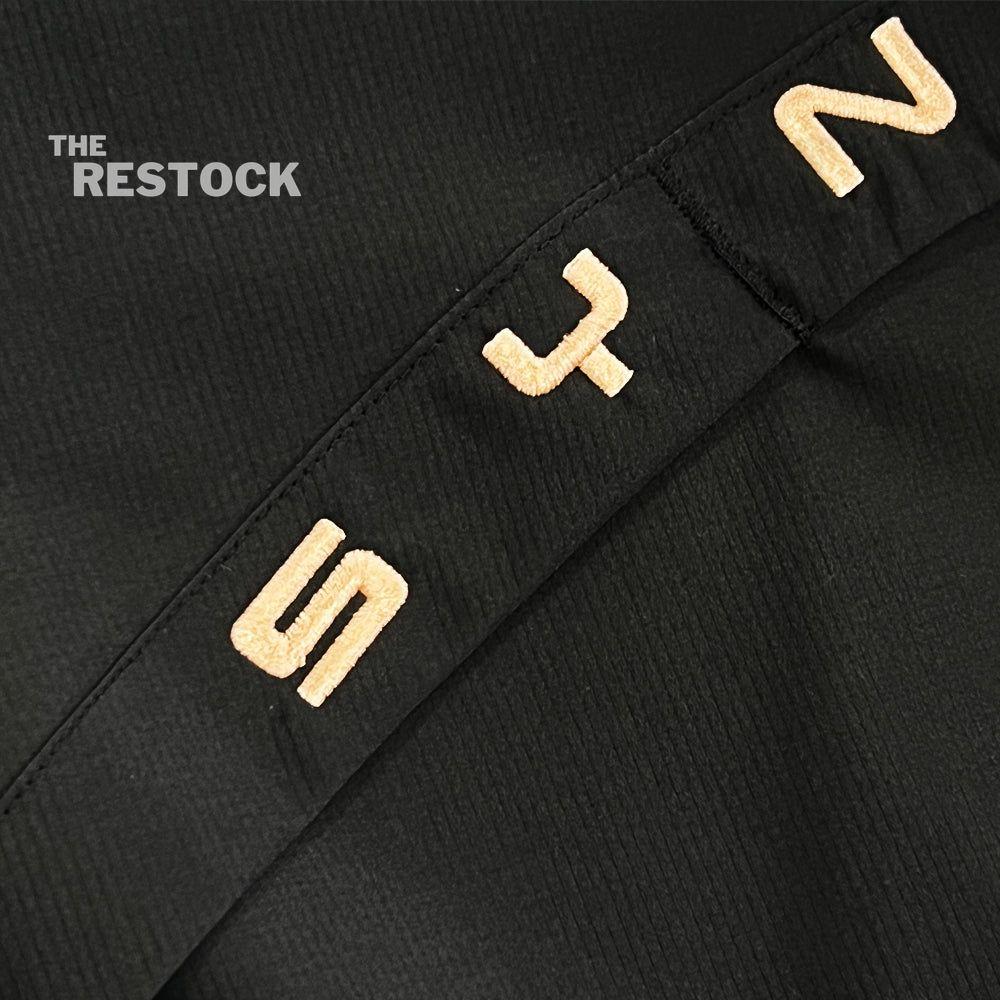 Syna World Vortex Woven Jacket - Black / Rose Gold